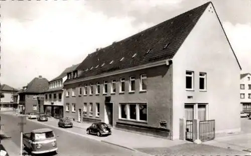 Ak Rahden in Ostwestfalen Lippe, Weher Straße mit Postamt, VW Käfer, Lastwagen