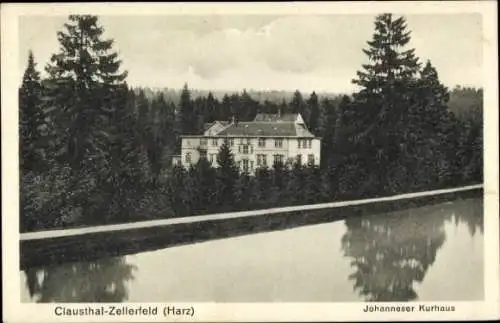 Ak Clausthal Zellerfeld im Oberharz, Johanneser Kurhaus, Außenansicht, Wasser, Wald