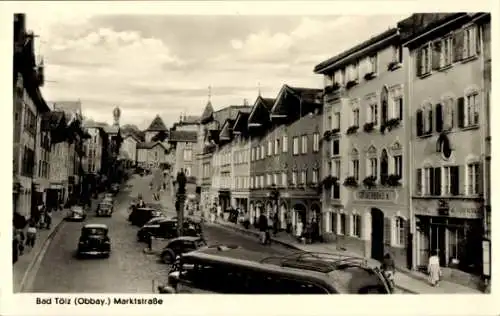 Ak Bad Tölz in Oberbayern, Marktstraße, Geschäfte, Fahrzeuge