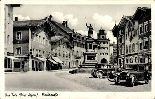 Ak Bad Tölz in Oberbayern, Markstraße, Denkmal, Fahrzeuge