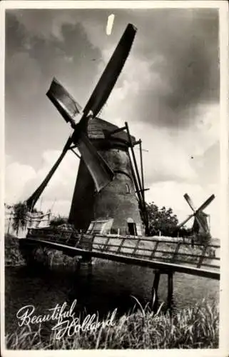 Ak Niederlande, Windmühlen, Brücke, Fluss