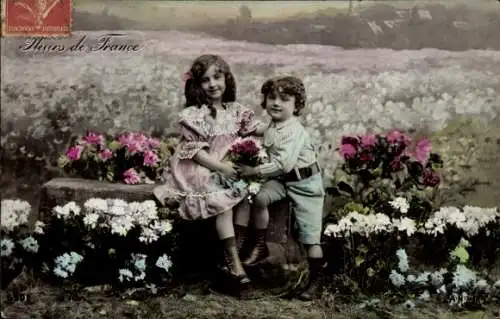 Ak Kinder, Junge und Mädchen, Portrait, Blumen, Blumenfeld