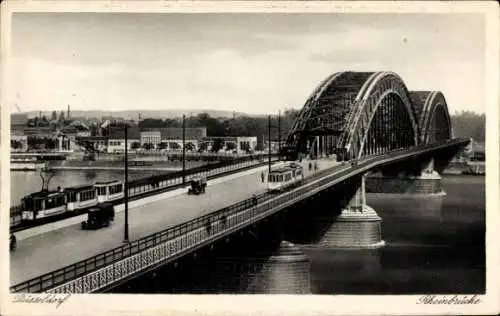 Ak Düsseldorf am Rhein, Rheinbrücke, Straßenbahnen