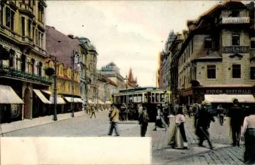 Ak Prag Praha, Graben, Straßenbahn, Passanten, Geschäft Hynek Gottwald, Cafe Wien