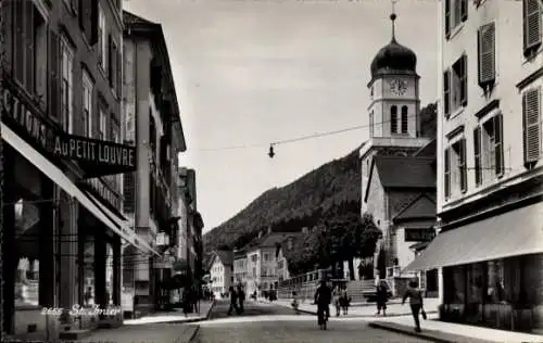 Ak Lausanne Kanton Waadt, Straßenpartie, Glockenturm, Geschäfte