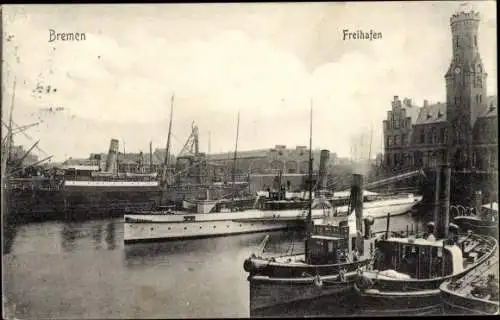 Ak Hansestadt Bremen, Freihafen mit Schaufelraddampfer