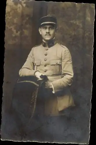 Foto Ak Französischer Soldat in Uniform, Jahr 1919