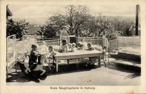 Ak Kettwig Essen im Ruhrgebiet, Kreis-Säuglingsheim, Kinder auf der Terrasse, Schaukelpferd