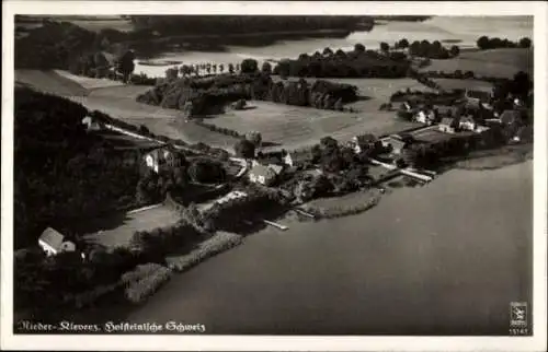 Ak Niederkleveez Bösdorf in Holstein, Totalansicht, Fliegeraufnahme