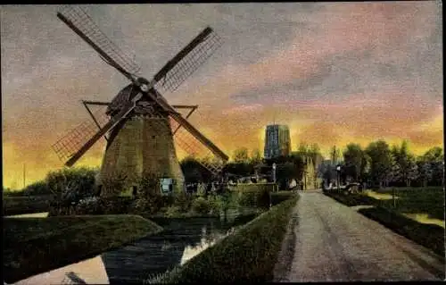 Ak De Lier Südholland, Straßenpartie mit Windmühle, Kirche