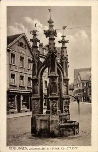 Ak Reutlingen in Württemberg, Lindenbrunnen in der Wilhelmstraße, Geschäft G. Unfried