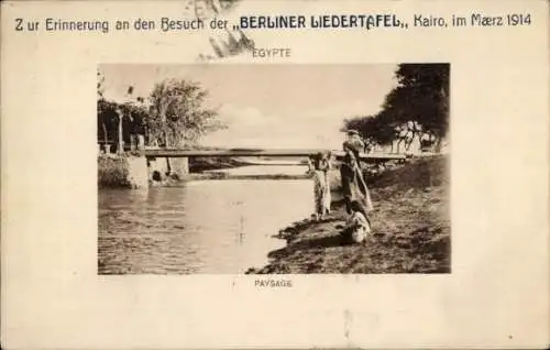 Ak Cairo Kairo Ägypten, Menschen am Fluss, Brücke, Besuch der Berliner Liedertafel 1914