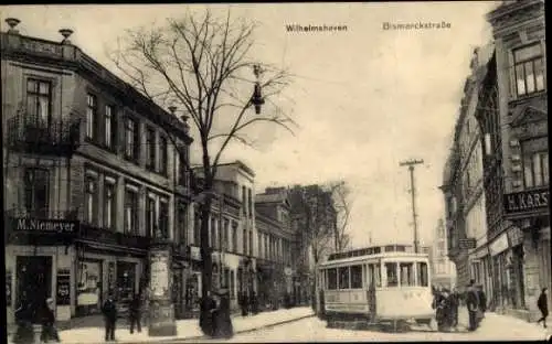 Ak Wilhelmshaven an der Nordsee, Straßenbahn in der Bismarckstraße, Litfaßsäule