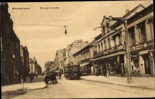 Ak Wilhelmshaven in Niedersachsen, Bismarckstraße, Straßenbahn, Friseur