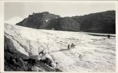 Foto Russland, Berggipfel im Schnee, Kletterer