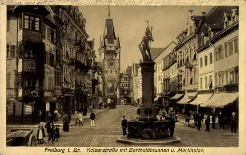 Ak Freiburg im Breisgau, Kaiserstraße, Bertholdsbrunnen, Martinstor, Geschäfte, Erker