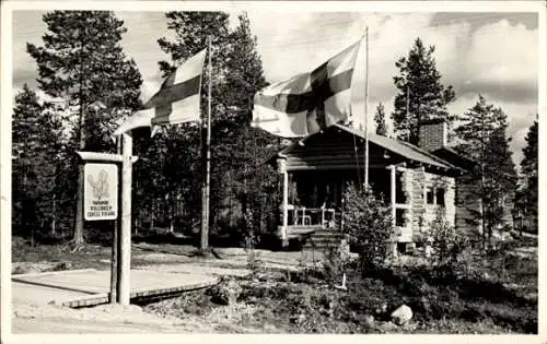 Foto Ak Rovaniemi Finnland, Holzhaus, Fahnen