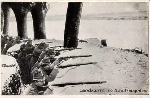 Ak Landsturm im Schützengraben, Soldaten in Uniformen, Gewehr, Kaiserzeit