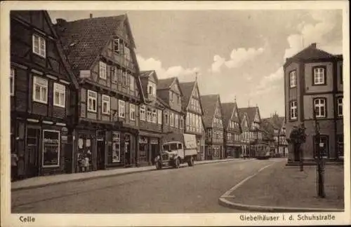 Ak Celle in Niedersachsen, Schuhstraße, Giebelhäuser, Geschäfte, Lastwagen, Straßenbahn