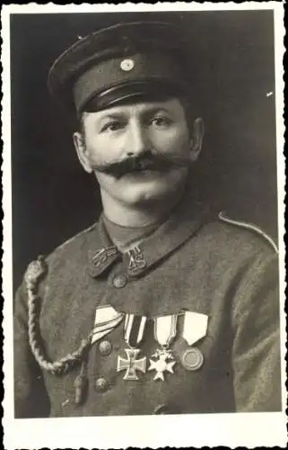 Foto Ak Deutscher Soldat in Uniform, Landsturm I B 48