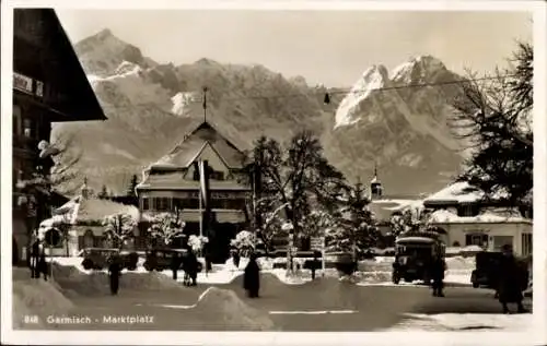 Ak Garmisch Partenkirchen in Oberbayern, Marktplatz, Winter