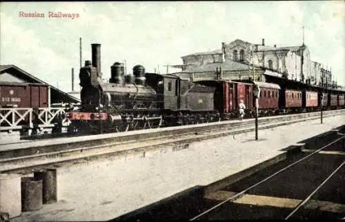 Ak Russische Eisenbahn in einem Bahnhof, Dampflok