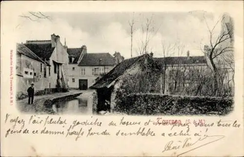 Ak Tournan Seine et Marne, Ortspartie, Fluss, Häuser