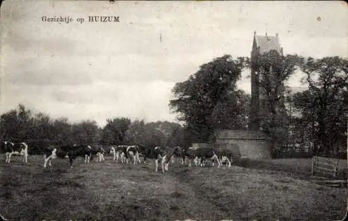 Ak Huizum Friesland Niederlande, Kühe auf der Weide, Kirchturm