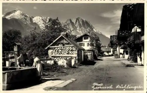 Foto Ak Garmisch Partenkirchen in Oberbayern, Frühlingstraße