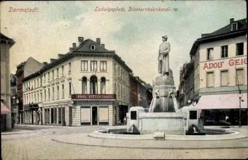 Ak Darmstadt in Hessen, Ludwigsplatz, Bismarckdenkmal, Geschäft Karl Rittershaus, Adolf Geig...