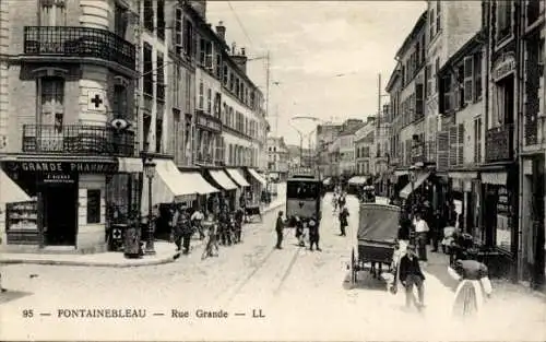 Ak Fontainebleau Seine et Marne, Rue Grande, Straßenbahn