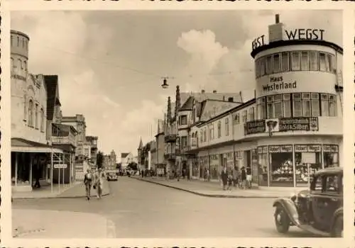 Foto Ak Westerland auf Sylt, Haus Westerland, Geschäft Robert Wegst