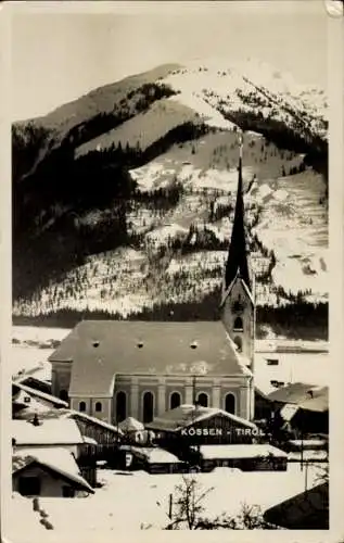 Ak Kössen in Tirol, Kirche im Winter