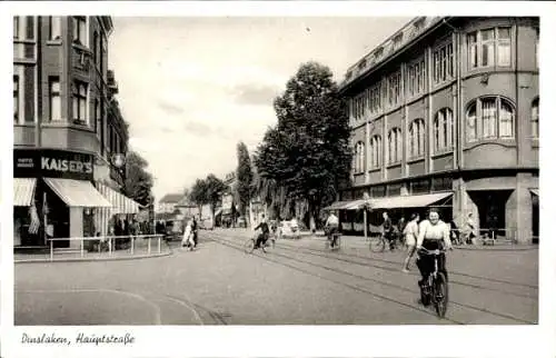 Ak Dinslaken am Niederrhein, Hauptstraße, Kaiser's Kaffeegeschäft, Fahrradfahrer