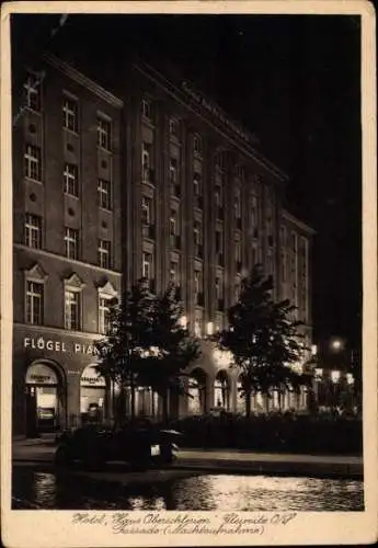 Ak Gliwice Gleiwitz Oberschlesien, Hotel Haus Oberschlesien, Nachtansicht, Pianohandlung