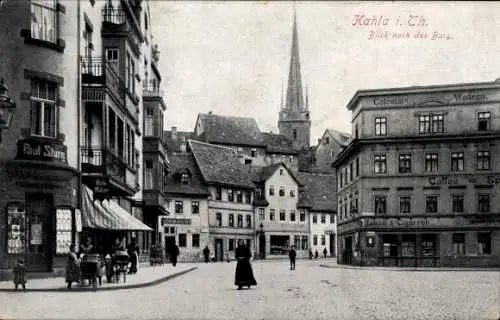 Ak Kahla Thüringen, Straßenpartie, Blick nach der Burg, Kolonialwarengeschäft