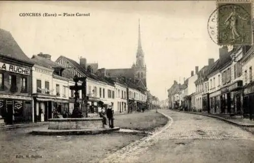 Ak Conches Eure, Place Carnot, Brunnen, Geschäfte