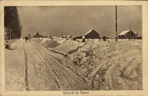 Ak Kobylnik Westpreußen, Straße, Häuser, Schnee