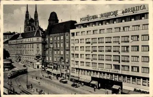 Ak Brno Brünn Südmähren, Riunione Adriatica di Sicurta, Bahnhofplatz, Straßenbahn