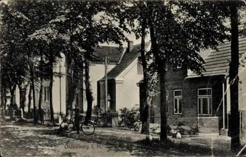 Ak Oldenburg in Holstein, Straßenpartie, Fahrrad