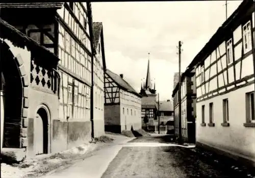 Ak Reinstädt im Saale Holzland Kreis Thüringen, Straßenpartie im Ort, Fachwerkhäuser, Kirchturm