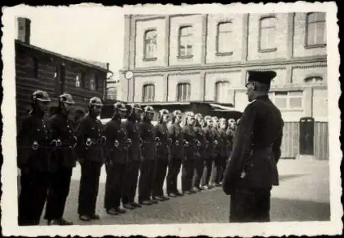 Foto Feuerwehrleute in Uniformen