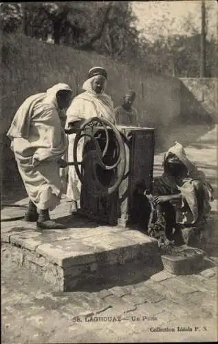 Ak Laghouat Algerien, Personen an einem Brunnen, Maghreb