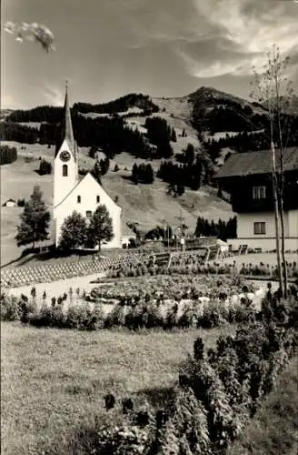 Ak Hirschegg Mittelberg im Kleinwalsertal Vorarlberg, Teilansicht, Kirche