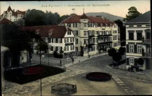 Ak Bad Pyrmont in Niedersachsen, Brunnenplatz mit Brunnenstraße