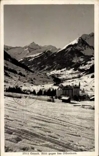 Ak Gstaad Saanen Kanton Bern, Teilansicht, Oldenhorn, Winterlandschaft