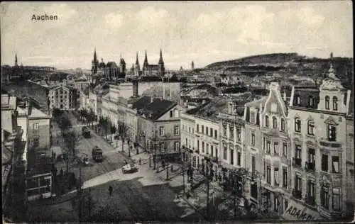 Ak Aachen Westfalen, Straßenpartie mit Straßenbahnen, Kirchen