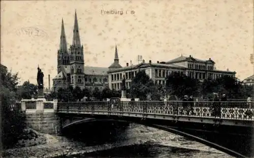 Ak Freiburg im Breisgau, Teilansicht, Brücke, Kirche