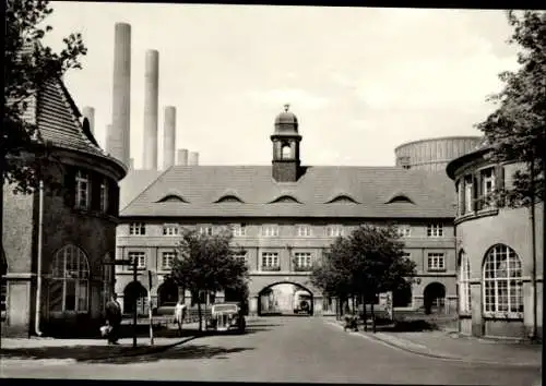 Ak Zschornewitz Gräfenhainichen in Sachsen Anhalt, Blick auf den Rathenauplatz, Schornsteine, Tor