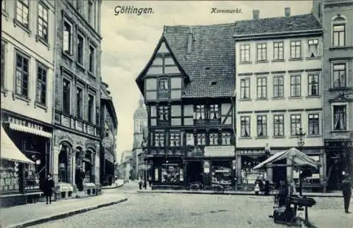 Ak Göttingen in Niedersachsen, Kornmarkt, Geschäfte E. Hader, H. Eisfeld, G. Quentin, L. Pape